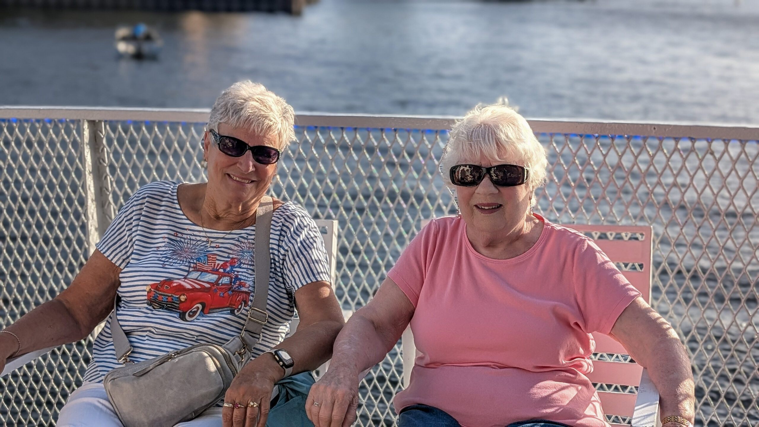 SMV Sunset Cruise 2026 Image of two elderly women sitting on a boat enjoying a sunset cruise.